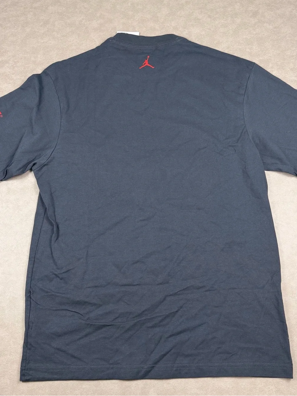 Jordan Black Tee with Red Jumpman Detail